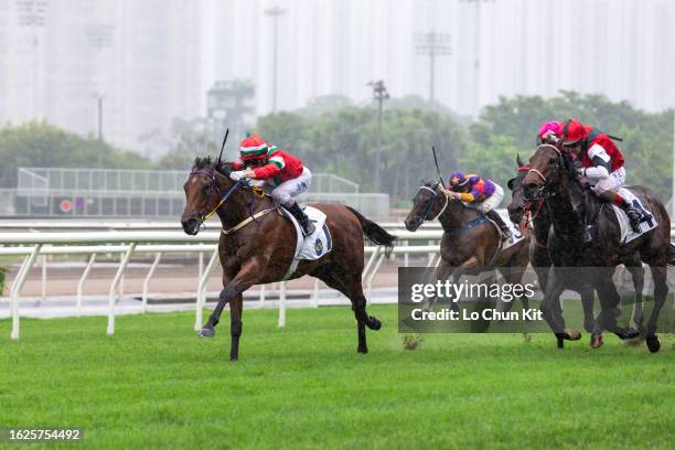 Jockey Zac Purton riding Pulsar Strider wins the Race 3 Macau-Taipa Bridge Handicap at Sha Tin Racecourse on May 13, 2023 in Hong Kong.