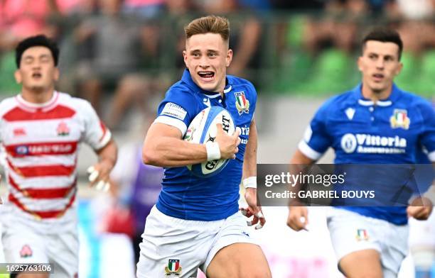 Italy's scrum-half Stephen Varney runs to score a try during the Rugby union match Italy vs Japan on August 26, 2023 at the Monigo stadium in Treviso...