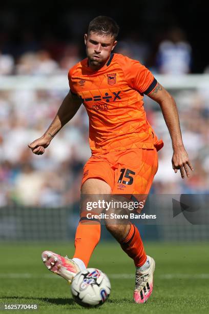 Cameron Burgess of Ipswich Town passes the ball during the Sky Bet Championship match between Queens Park Rangers and Ipswich Town at Loftus Road on...