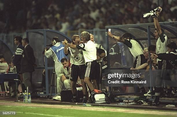 Kenny Dalglish, the Newcastle United manager celebrates with his assistant, Terry McDermot as their team snatch a last minute equaliser during the...