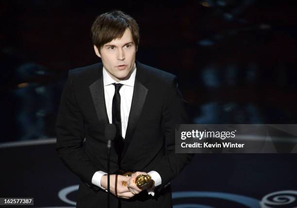 Writer Shawn Christensen accepts the Best Live Action Short Film award for "Curfew" onstage during the Oscars held at the Dolby Theatre on February...