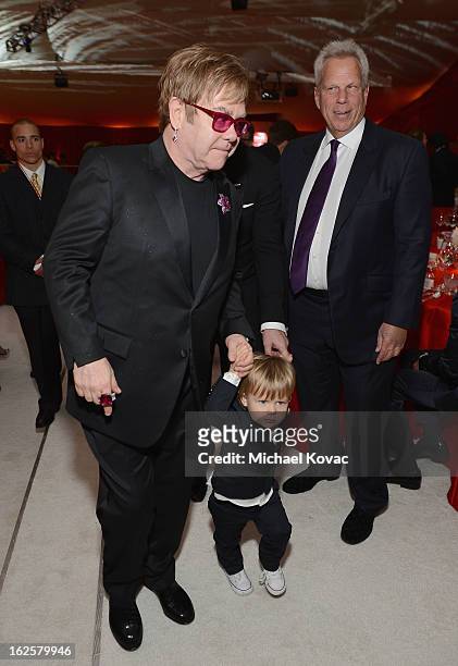 Sir Elton John, Zachary Furnish-John and Chairman and Executive Vice President of the New York Giants Steve Tisch attend the 21st Annual Elton John...