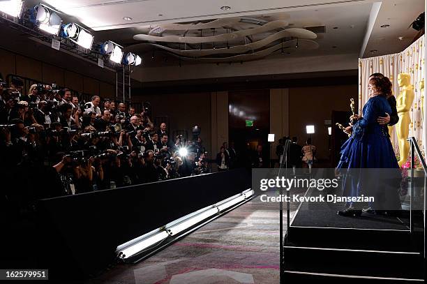 Directors Mark Andrews and Brenda Chapman, winners of the Best Animated Feature award for "Brave," pose in the press room during the Oscars held at...