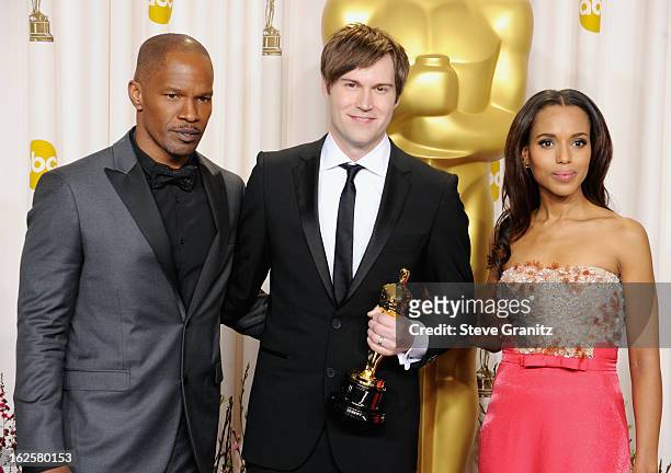 Presenter Jamie Foxx, animator John Kahrs and presenter Kerry Washington pose in the press room during the Oscars at the Loews Hollywood Hotel on...