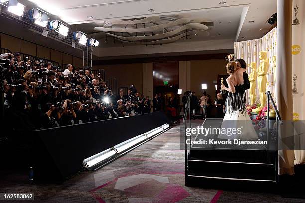 Sean Fine and Andrea Nix Fine pose with the Best Documentary Short Subject award for 'Inocente' in the press room during the Oscars held at Loews...