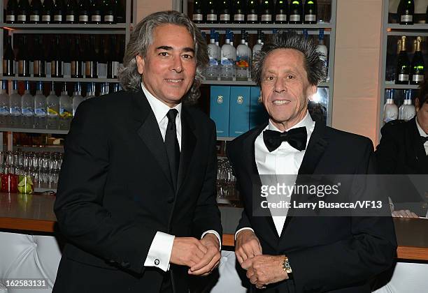Producers Mitch Glazer and Brian Grazer attend the 2013 Vanity Fair Oscar Party hosted by Graydon Carter at Sunset Tower on February 24, 2013 in West...