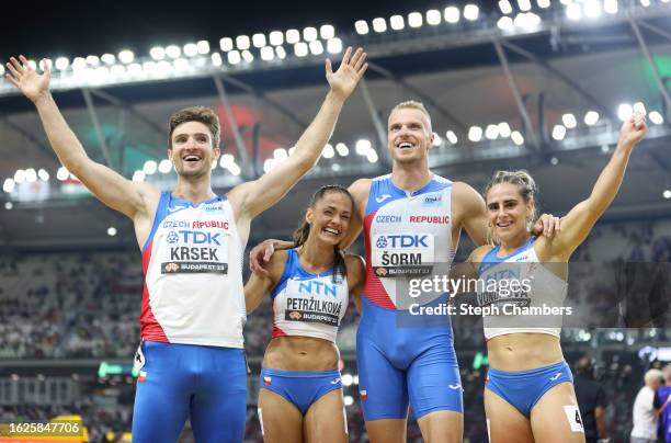 Matej Krsek, Tereza Petrzilkova, Patrik Sorm and Lada Vondrova of Team Czech Republic celebrate after winning the Bronze Medal in the 4x400m Mixed...