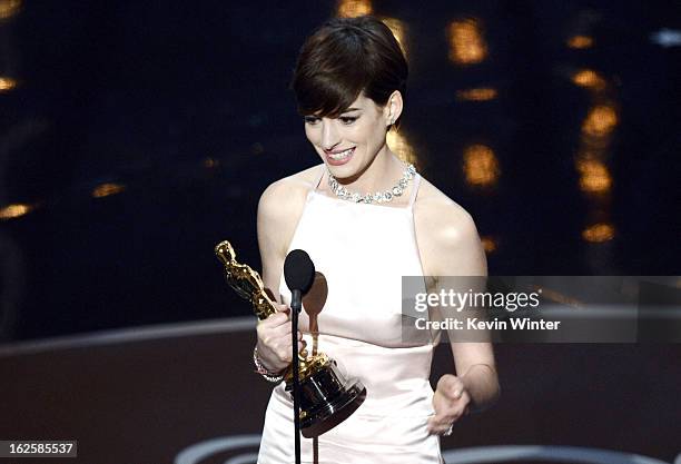 Actress Anne Hathaway accepts the Best Supporting Actress award for "Les Miserables" onstage during the Oscars held at the Dolby Theatre on February...