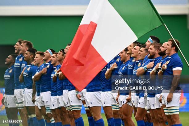 Italian players sing the national anthem before the Rugby union match Italy vs Japan on August 26, 2023 at the Monigo stadium in Treviso as part of...