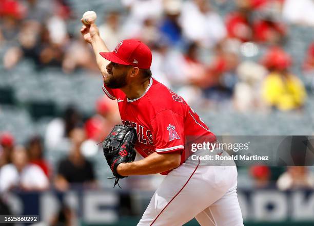 Chase Silseth of the Los Angeles Angels throws against the Tampa Bay Rays in the first inning during game one of a doubleheader at Angel Stadium of...