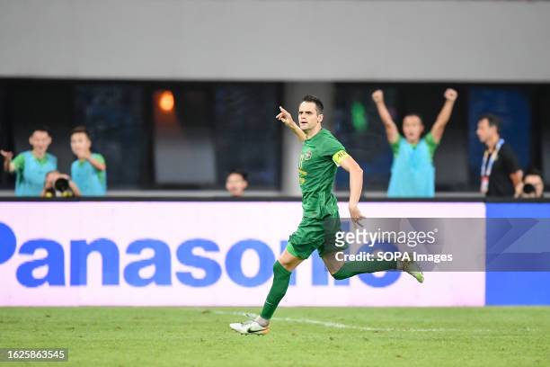 Franko Andrijaevi of Zhejiang FC celebrates after scoring a goal during the AFC Champion League Qualify Play off match between Zhejiang FC and Port...