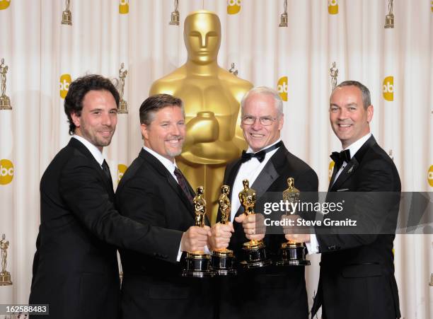 Bill Westenhofer, Guillaume Rocheron, Erik-Jan De Boer and Donald R. Elliott pose in the press room during the Oscars at the Loews Hollywood Hotel on...