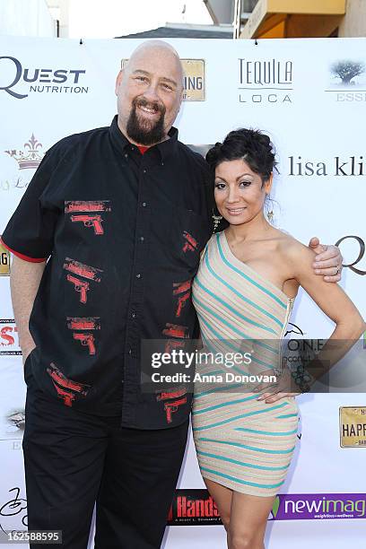 Director Scott L. Schwartz and Shams Fire & Water Goddess attend the Los Angeles premiere of the movie "Changing Hands" at The Happy Ending Bar &...