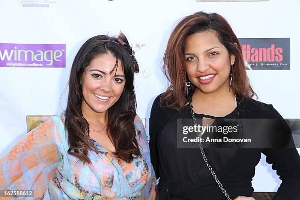 Dina Renne and Rochell Cardona attend the Los Angeles premiere of the movie "Changing Hands" at The Happy Ending Bar & Restaurant on February 24,...