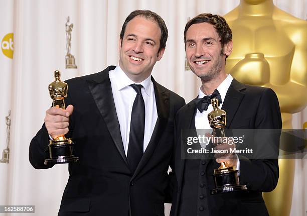 Filmmakers Simon Chinn and Malik Bendjelloul, winners of the Best Documentary  Feature award for "Searching for Sugar Man," pose in the press room...