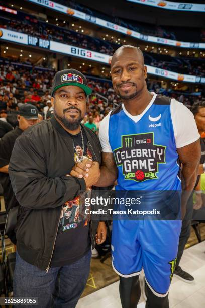 Coach Ice Cube and Vernon Davis of Team Webull pose during the Monster Energy BIG3 Celebrity Game at Capital One Arena on August 19, 2023 in...