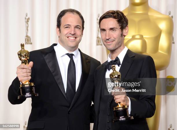 Filmmakers Simon Chinn and Malik Bendjelloul, winners of the Best Documentary  Feature award for "Searching for Sugar Man," pose in the press room...
