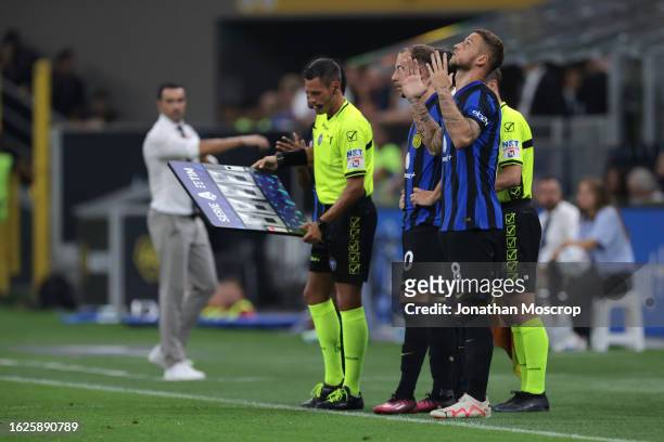 Marko Arnuatovic of FC Internazionale reacts as he prepares to enter the field of play as a substitute during the Serie A TIM match between FC...
