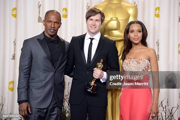 Filmmaker Shawn Christensen , winner of the Best Live Action Short Film award for "Curfew," with presenters Jamie Foxx and Kerry Washington , pose in...