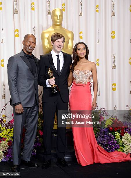 Filmmaker Shawn Christensen , winner of the Best Live Action Short Film award for "Curfew," with presenters Jamie Foxx and Kerry Washington , pose in...