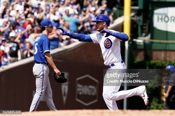 Cody Bellinger of the Chicago Cubs hits a two-run home run during the first inning of a game against the Kansas City Royals at Wrigley Field on...