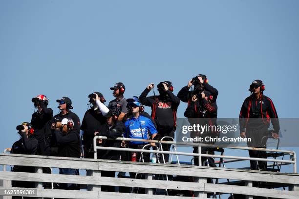 Team spotters watch the race during the NASCAR Xfinity Series Shriners Children's 200 at The Glen at Watkins Glen International on August 19, 2023 in...