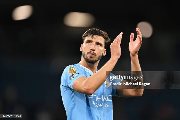 Ruben Dias of Manchester City applauds the fans following the team's victory during the Premier League match between Manchester City and Newcastle...