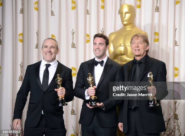 Sound engineers Simon Hayes, Mark Paterson and Andy Nelson, winners of the Best Sound Mixing award for "Les Miserables," pose in the press room...
