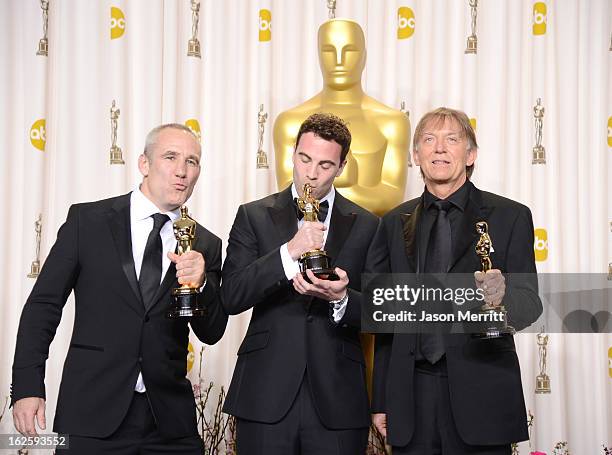 Sound engineers Simon Hayes, Mark Paterson and Andy Nelson, winners of the Best Sound Mixing award for "Les Miserables," pose in the press room...