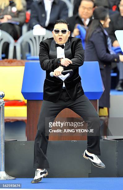 South Korean rapper Park Jae-Sang , also known as "Psy", dances before the presidential inauguration ceremony for South Korea's incoming president...