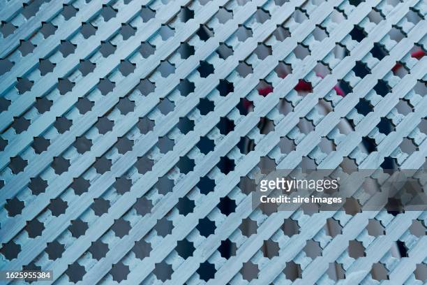 close-up of fence fence on garage exterior of a house with no people around, front view - spanish crisis closes the door industry stock pictures, royalty-free photos & images