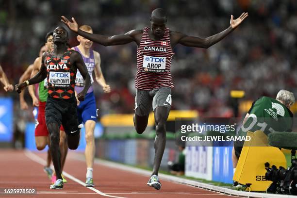 Canada's Marco Arop reacts as he crosses the finish line in the men's 800m final during the World Athletics Championships at the National Athletics...