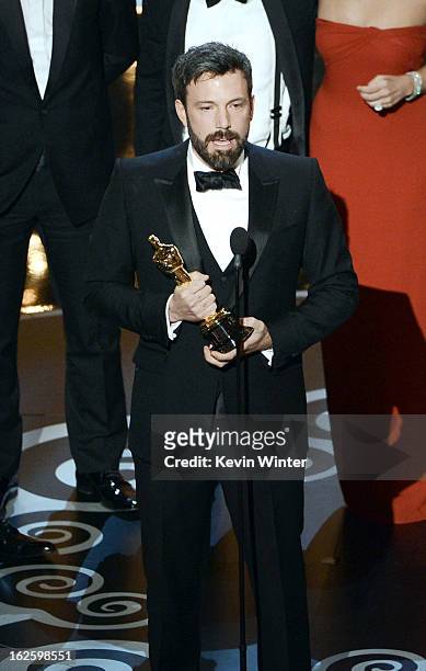 Actor/producer/director Ben Affleck accepts the Best Picture award for Argo onstage along with members of the cast and crew during the Oscars held...