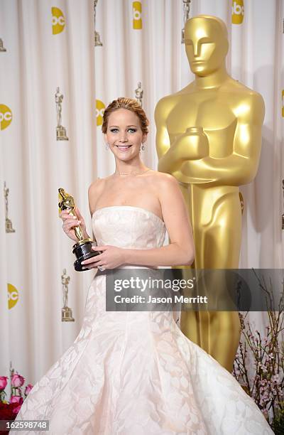 Actress Jennifer Lawrence, winner of the Best Actress award for "Silver Linings Playbook," poses in the press room during the Oscars held at Loews...