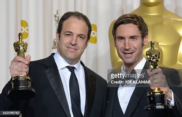 Malik Bendjelloul and Simon Chinn celebrate winning Best Documentary Feature "Searching for Sugar Man" during the 85 Academy Awards on February 24,...