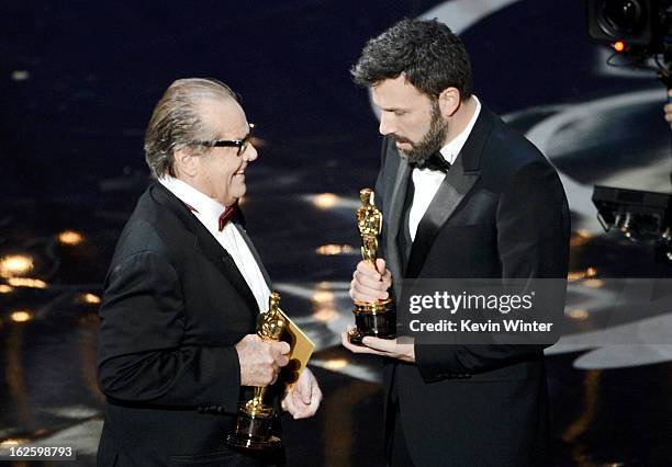 Presenter Jack Nicholson talks with actor/producer/director Ben Affleck as he accepts the Best Picture award for Argo onstage during the Oscars...