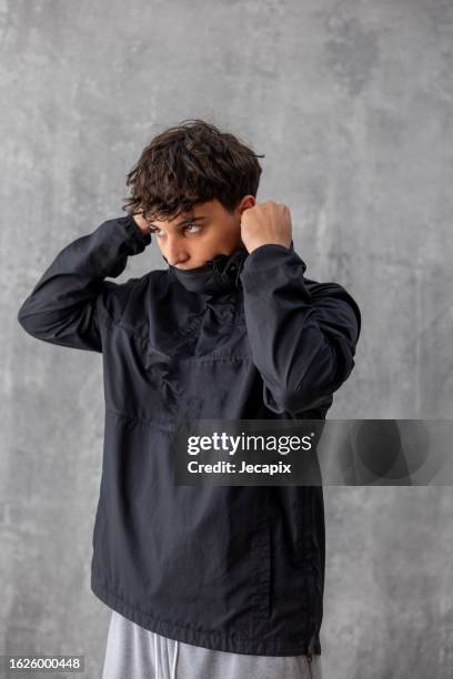 modern man - windbreak stock pictures, royalty-free photos & images