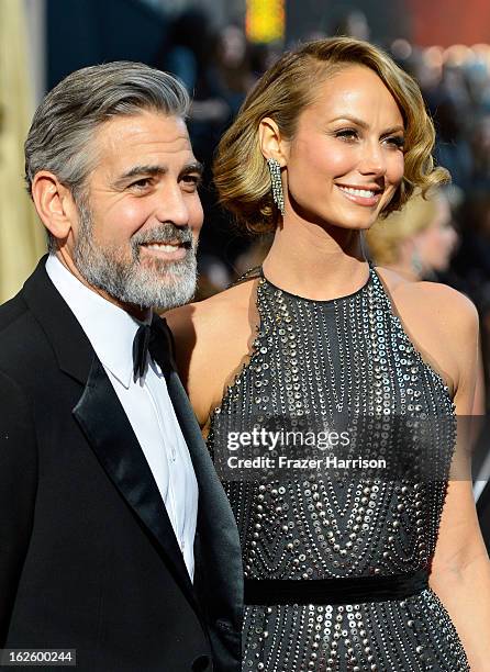 Actors George Clooney and Stacy Keibler arrive at the Oscars at Hollywood & Highland Center on February 24, 2013 in Hollywood, California.