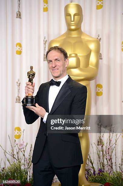 Composer Mychael Danna, winner of the Best Original Score award for "Life of Pi," poses in the press room during the Oscars held at Loews Hollywood...