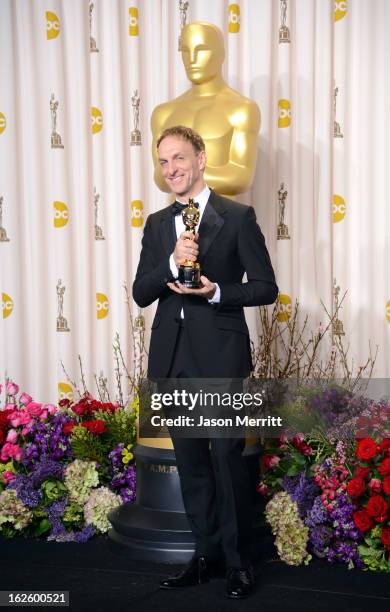 Composer Mychael Danna, winner of the Best Original Score award for "Life of Pi," poses in the press room during the Oscars held at Loews Hollywood...