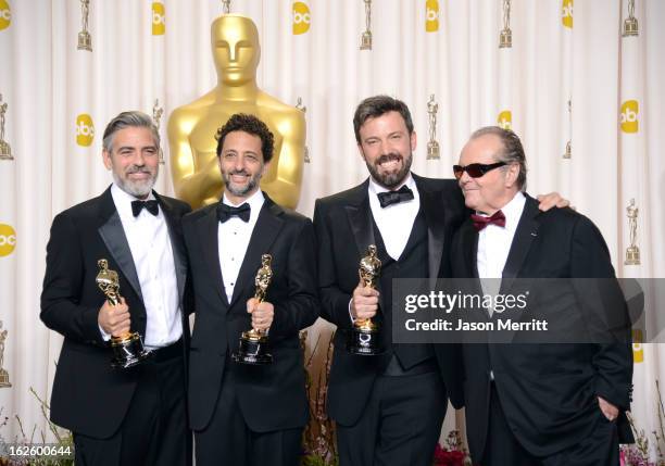 Producers George Clooney and Grant Heslov and actor-producer-director Ben Affleck, winners of the Best Picture award for "Argo," with presenter Jack...