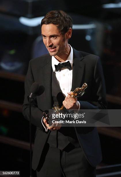 Filmmaker Malik Bendjelloul accepts the Best Documentary - Feature award for 'Searching for Sugar Man' onstage during the Oscars held at the Dolby...