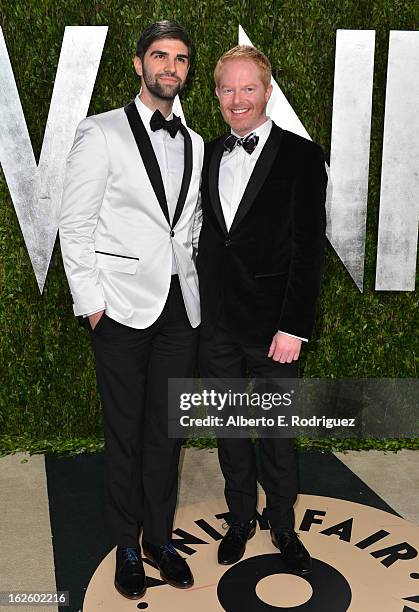 Actor Jesse Tyler Ferguson and Justin Mikita arrives at the 2013 Vanity Fair Oscar Party hosted by Graydon Carter at Sunset Tower on February 24,...