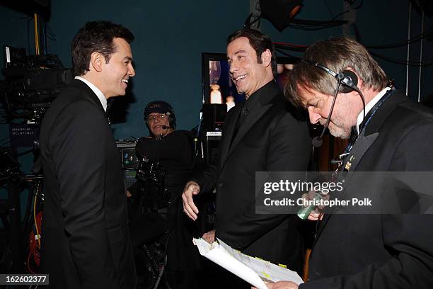 Host Seth MacFarlane and John Travolta backstage during the Oscars held at the Dolby Theatre on February 24, 2013 in Hollywood, California.