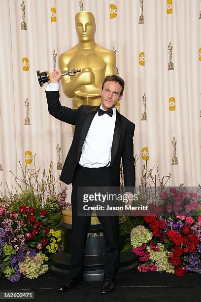 Screenwriter Chris Terrio, winner of the Best Adapted Screenplay award for "Argo," poses in the press room during the Oscars held at Loews Hollywood...