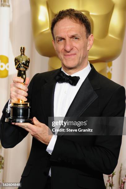 Composer Mychael Danna poses in the press room during the Oscars at the Loews Hollywood Hotel on February 24, 2013 in Hollywood, California.