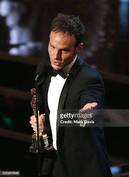 Writer Chris Terrio accepts the Best Writing - Adapted Screenplay for 'Argo' onstage during the Oscars held at the Dolby Theatre on February 24, 2013...