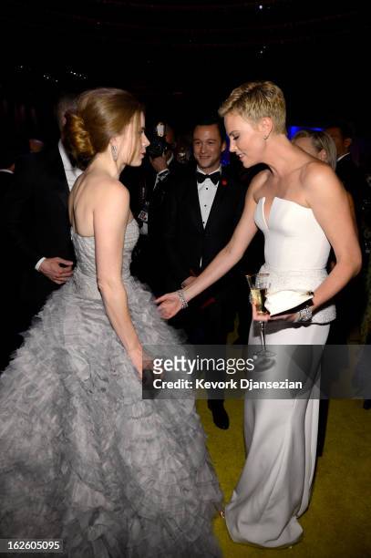 Actors Amy Adams, Joseph Gordon-Levitt and Charlize Theron attend the Oscars Governors Ball at Hollywood & Highland Center on February 24, 2013 in...