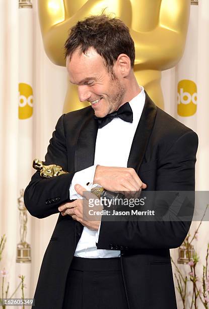 Screenwriter Chris Terrio, winner of the Best Adapted Screenplay award for "Argo," poses in the press room during the Oscars held at Loews Hollywood...