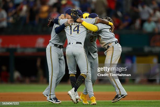 Andruw Monasterio of the Milwaukee Brewers and his teammates celebrate beating the Texas Rangers at Globe Life Field on August 19, 2023 in Arlington,...